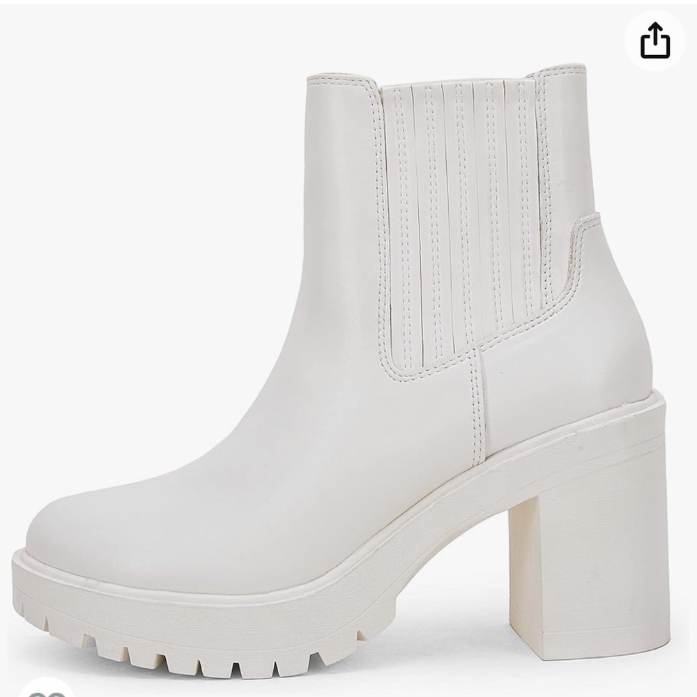 Platform lug sole Chelsea boot with chunky block heel. Brand new in box.